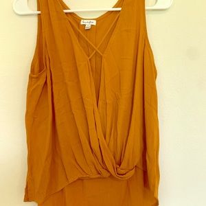Sleeveless Low cut front wrap top